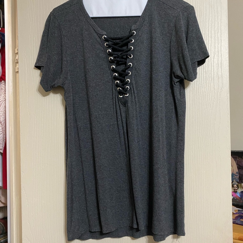 T-shirt from buckle with string crossing in the front
